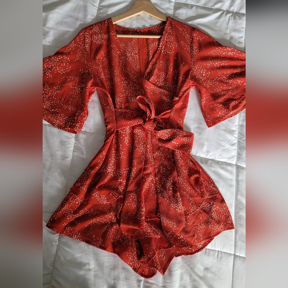 NWOT Orange Flowy Romper